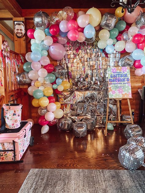 #retro #bachelorettepartyideas #party #groovy #disco #bachtothe70s #captainmorgan #flowers #balloons #balloonarch #brumate 70d Party Decorations, Groovy Dance Party, Retro Sweet 16, Disco First Birthday Party, Groovy Graduation Party, Disco Balloon Arch, 70’s Party Ideas, Disco Graduation Party, Groovy Disco Party