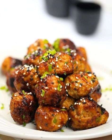 These delicious Teriyaki Chicken Meatballs are full of flavor and perfectly seasoned. They are juicy and simple to make for a quick meal. Serve them with a  side of rice and veggies and you have a wonderful meal on a busy weeknight.  How to Make Teriyaki Chicken Meatballs:To make this teriyaki chicken meatballs recipes you will need the following ingredients and follow the instructions below.  1 pound ground chicken Chicken Teriyaki Meatballs, Teriyaki Chicken Meatballs, Chicken Meatballs Recipe, Meatballs Recipes, Rice And Veggies, Teriyaki Meatballs, Chicken Meatball Recipes, Honey And Soy Sauce, Meatballs Recipe