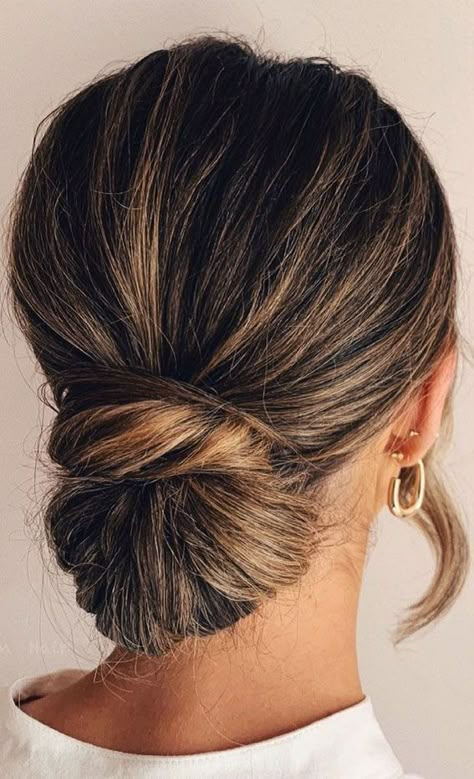 39 The most romantic wedding hair dos to get an elegant look Low Knot Wedding Hair, Wedding Hairstyles Minimalist, Bridal Knot Bun, Low Bun Wedding Hair For Short Hair, Bride Hair Low Bun, Low Bun Braid Hairstyles, Wedding Hair Bun Low, Low Bun For Wedding, Bridesmaid Low Bun