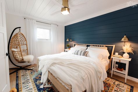 Modern coastal bedroom makeover with deep blue shiplap wall, vinyl plank flooring, IKEA furniture, and gold accents Teal Shiplap Wall, Thrifted Pieces, Modern Coastal Bathroom, Shiplap Feature Wall, Modern Coastal Bedroom, Lake House Bedroom, Diy Mommy, Installing Shiplap, Shiplap Ceiling