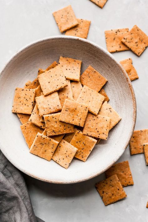 Paleo crackers made with almond flour. You’ll only need 4 ingredients for these deliciously crispy protein-packed low carb crackers. Plus we’ve got 5 different flavor variations for you to try! #paleo #keto #lowcarb #crackers Lowcarb Crackers, Paleo Bites, Almond Crackers, Paleo Crackers, Aip Keto, Keto Crackers, Low Carb Crackers, Brand Manager, Ambitious Kitchen