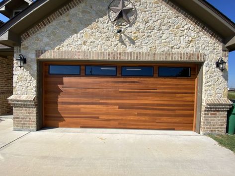 Wood-look steel garage door by CHI Plank Garage Door, Chi Garage Doors, Steel Garage Door, Unique Garage Doors, Faux Wood Garage Door, Double Garage Door, Plank Door, Garage Door Panels, Modern Garage Doors