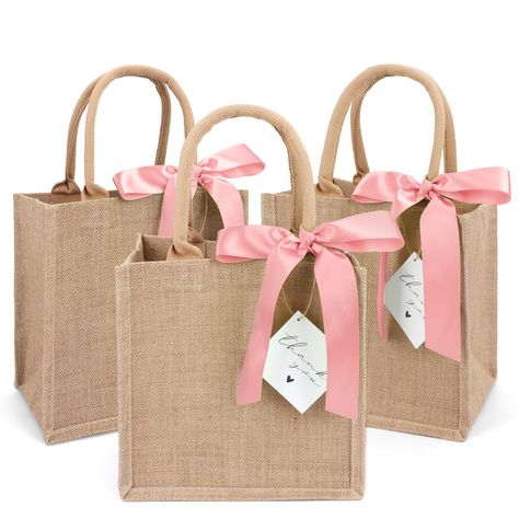 PRICES MAY VARY. ✔ PACKAGE INCLUDES - 3 burlap tote bag,3 pink silk ribbon and 3 thank you card. You can use these silk ribbon and thank you card to decorate them as burlap gift bags for your parties! ✔DURABLE AND REUSABLE - The burlap bag is made of 100% natural jute, so they are great for the environment. Thickened jute(450gsm thickness) makes them stronger，durable and reusable. ✔ MEDIUM SIZE BUT LARGE CAPACITY - Approximately 9.8 x 9.8 x 7in. Perfect size to hold various items of daily use, d 21st Birthday Gift Bags For Guest, Bachelorette Beach Party, Guest Basket, Bachelorette Gift Bags, Bachelorette Beach, Lemongrass Spa, Burlap Gift Bags, Burlap Tote Bags, Burlap Tote