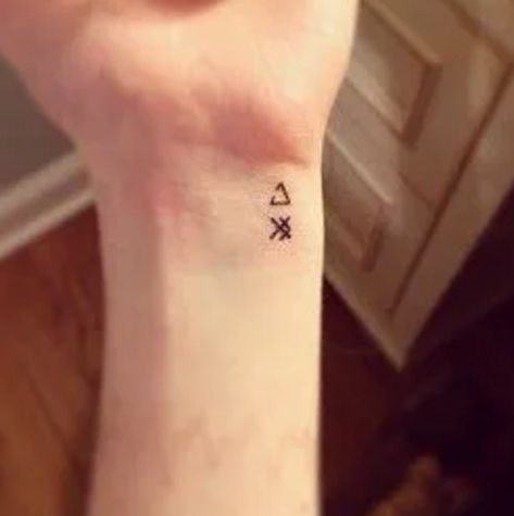 20 Tiny Tattoos With Big Meanings Tiny Tattoos With Meaning, Colon Tattoo, Tiny Tattoos For Women, Greek Symbol, Semicolon Tattoo, Small Tattoos With Meaning, Meaningful Tattoos For Women, Harry Potter Tattoos, Small Meaningful Tattoos