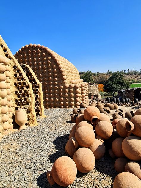 This intervention of reviving the Al-Nazlah area in Fayoum aims to create a pilot project in contexts of specificity. The valuable district incubates pottery workshops which have been producing special pots used for construction since Ancient Egyptian Civilization. Thus, the upgraded construction technique which enhanced the bonding material by gluing the pots together with the help of lab experiments maintained the traditional technique. Also, new forms have been introduced for roofing construc Pottery Architecture, Ancient Egyptian Civilization, Sculpture Architecture, Egyptian Civilization, Elegant Fashion Outfits, Mud House, Pottery Workshop, Clay Pots, Ancient Egyptian