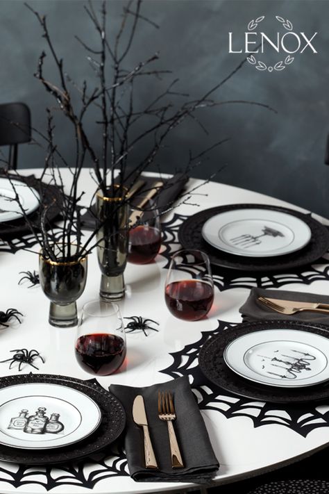 Pair the Lenox Chelse Muse Fleur Matte Black 4-piece Dinner Plate Set crafted of durable and intriguing black ironstone with wickedly enchanting Vintage Halloween 4-piece dessert plate set crafted of ivory porcelain and features hand-drawn artwork of a chandelier, a raven, potions and a candelabra. This table setting will bring a bit of haunted mystery to your home and add well with formal and casual dinnerware. #Halloween #cocktails #spookyseason #October #Halloweendecor Halloween Dinner Place Settings, Table Setting Halloween, Black Halloween Table Decor, Halloween Dinner Table Setting, Halloween Wedding Table Settings, Halloween Place Settings, Halloween Table Set Up, Gothic Table Setting, Halloween Dinner Table Decor