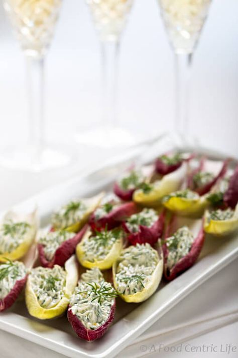 A great party appetizer, Endive with Green Goddess Cream Filling. Flavors of classic Green Goddess dressing with fresh herbs and lemon in a base of cream cheese. Endive Appetizers Boats, Stuffed Endive, Endive Appetizers, Herbed Cream Cheese, Pretty Presentation, Green Goddess Salad Dressing, Endive Recipes, Belgian Endive, Cream Cheese Appetizer