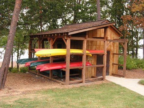 Canoe racks built with trusses and traditional wood joinery. Love this. Canoe Storage, Canoe Rack, Wood Kayak, Wooden Kayak, Utility Boat, Kayak Storage Rack, Dock House, Lake Wylie, Boat Shed