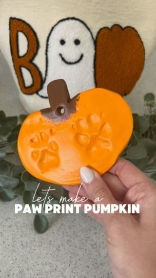 Tara Jackson on Instagram: "Let’s make a Halloween DIY Paw Print Pumpkin! 🔗 comment ‘PAW’ and I’ll send you everything you’ll need right to your inbox.  These items were significantly cheaper from Walmart. IMPORTANT **this clay is an air dry clay + needs to dry for a couple days before you can paint it!!  1. Roll the air dry clay out  2. Shape into a pumpkin 🎃 it’s okay if it’s a little lumpy because you’re going to smooth it with the rolling pin. 3.Press your paw into the clay. (**Make sure you leave some depth so it’s not super thin and fragile when it dries) 4. Cut out a hole with a straw! You can make this an ornament! — I placed on a paper plate and hid it inside a closet for a couple days. Once the clay was dry I painted with the acrylic craft paint, I did 2 coats. & let it dry for Paw Print Pumpkin, Diy Paw Print, Paw Print Art, Puppy Paw Prints, Dog Pumpkin, Pumpkin Stencil, Acrylic Craft Paint, Quick Diy, Craft Paint