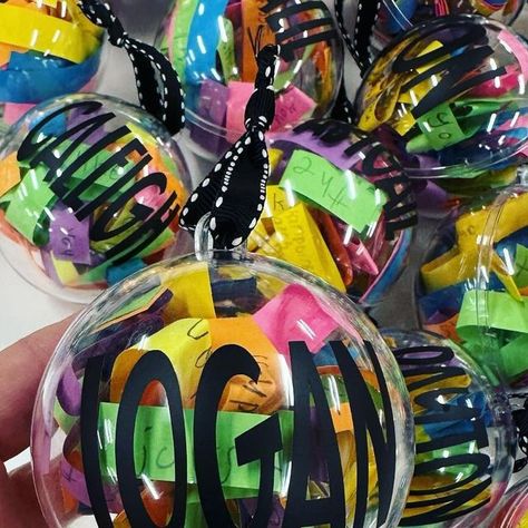 Joanne Miller on Instagram: "I hope my students will cherish these compliment ornaments! I cut up skinny strips of colored paper and each student wrote a positive sentence about each student in our class. They could write what they liked or appreciated about them, what makes them a good class family member or a good friend, what special qualities do they possess, etc. We completed about five a day for a week. These are the ornaments that open half so they can easily open them and read all the nice things their classmates think about them. I gave them to them on our last day before break as one of their gifts. ❤️ #teacher #teachers #teach #christmas #christmasornaments #christmasgifts #teachersofinstagram #school #student #teachersfollowingteachers" Ornaments For Students From Teacher, Student Gifts From Teacher, Class Family, Llama Christmas, Student Teacher Gifts, Ornament Tags, Special Needs Students, Clear Ornaments, Class Gift