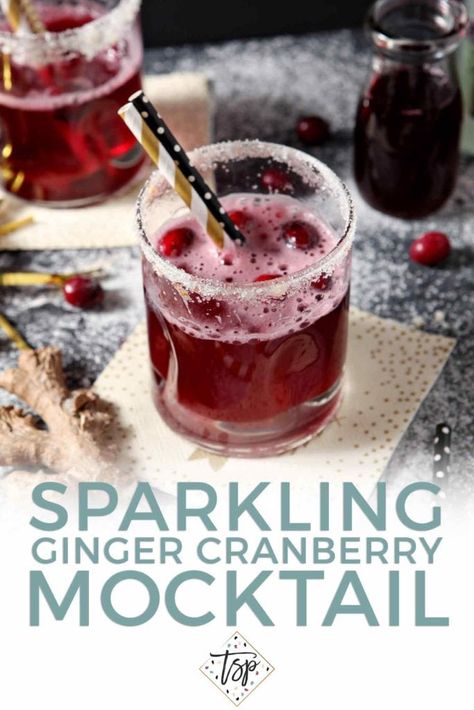 This bubbly Cranberry Mocktail is a festive celebration drink! Nonalcoholic and kid-friendly, this ginger beer drink is perfect for individuals or groups. #easyentertaining #newyearseve #speckledpalate Non Alcoholic Sparkling Drinks, Non Alcoholic Drinks Winter, Mocktails Non Alcoholic Winter, New Year’s Eve Mocktail, Christmas Mock Tails, New Year’s Eve Drinks, Winter Mocktails Non Alcoholic, Christmas Mocktails Non Alcoholic, Sparkling Mocktails