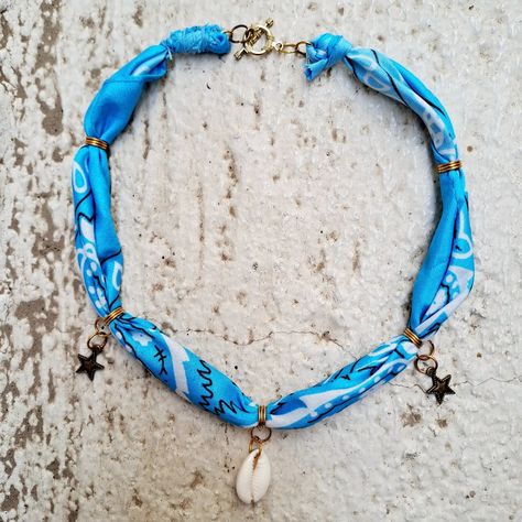 Dive into summer style with the ocean-inspired bandana necklace 🩵 Adorned with a beautiful shell charm, this turquoise bandana necklace is the perfect accessory for beach days and beyond. #bandanacrafts #pendantnecklace #beachstyle #summerfashion Summer Necklace Diy, Bandana Necklace, Bandana Crafts, Jewelry Bar, Ocean Jewelry, Ocean Inspired, Jewelry Fashion Trends, Summer Necklace, Boot Cuffs