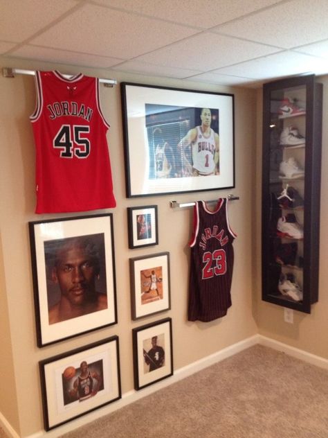 Chicago Bulls Man Cave Chicago Bulls Bedroom Ideas, Small Sports Man Cave Ideas, Sport Man Cave Ideas, Bedroom Into Man Cave, Men’s Office Decor Sports, Michael Jordan Room Ideas, Sports Office Decor Ideas Men, Sports Room Decor Man Caves, Men Game Room Ideas Man Cave