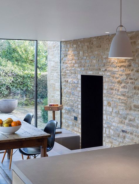 Original stone walls act as the backdrop for the new dining space and kitchen British Cottage, Yew Tree, Limestone Wall, Glass Extension, Cottage Renovation, Modern Extension, Kitchen And Dining Room, Stone Walls, House Extensions