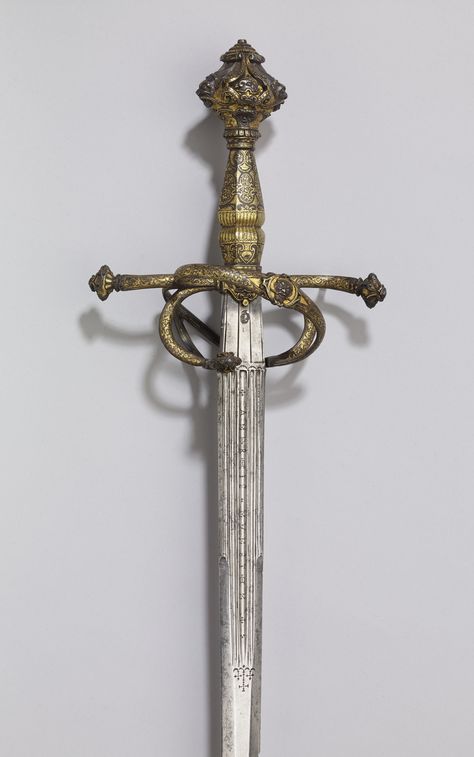 A sword made up in the 1800s for the dealer Frédéric Spitzer. Longsword Fantasy, Historic Swords, Antique Swords Vintage, Medieval Swords, Longsword Fantasy Art Swords, Historical Swords, Ornate Longsword, Swords Medieval, Arm Armor