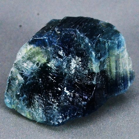 Raw Sapphire | Here’s a raw sapphire nugget. Already showing off its beauty. Raw Sapphire, Nose Bleeds, Blue Sapphire Jewelry, Sapphire Stones, Crystal Energy, Pretty Rocks, Skin Diseases, Beautiful Rocks, Floral Pendant