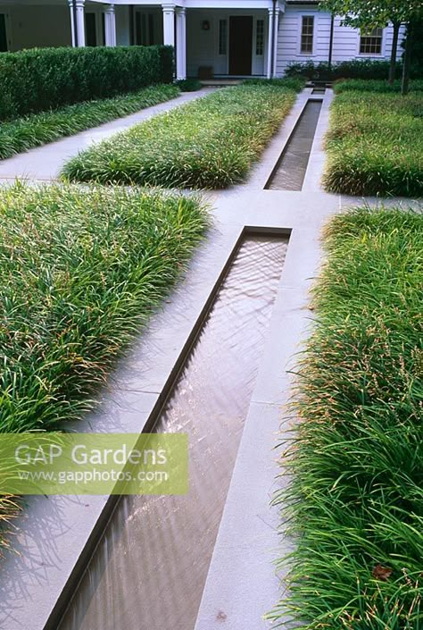 Contemporary water rill with grasses, paths and house in background - The Odrich Garden, Greenwich, Connecticut, USA Water Rill, Garden Stream, House Contemporary, Trendy House, Rock Fountain, Zen Zone, Garden Water Feature, Small Water Features, Pool Water Features