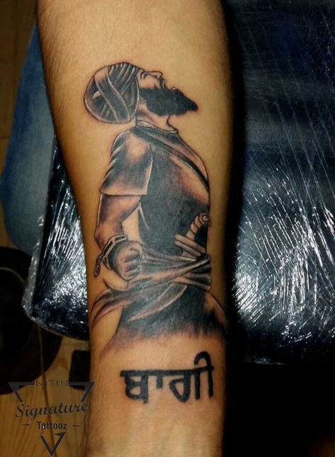 sikh warrior done by nitin gautam  at signature tattooz . Sikhism Tattoo Designs, Sikh Tattoo Ideas Men, Sikh Warrior Tattoo Design, Sikhism Tattoo, Punjabi Tattoo Men, Sikh Tattoo Ideas, Char Sahibzade, Char Sahibzade Pics, Sikh Tattoo