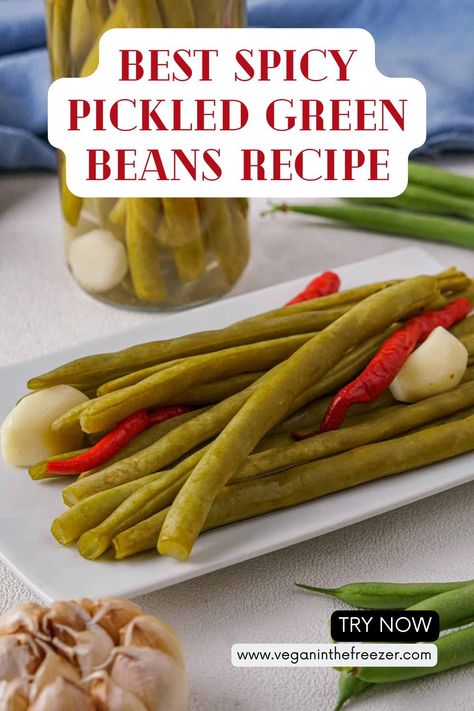 Add some zing to your meals with Spicy Pickled Green Beans! These pickled green beans are mildly spiced, making them a perfect snack or appetizer. Simply combine fresh green beans, garlic, red chile peppers, and a tangy brine for a delicious treat. Let them pickle for 2 days in the fridge for the best flavor. Serve and enjoy within 2 weeks! #SpicyPickledGreenBeans #PickledVegetables #VeganRecipes Crispy Green Bean Recipes, Spicy Pickled Beans, Pickled Green Beans Recipe, Spicy Pickled Green Beans, Pickled Green Bean Recipes, Green Beans Garlic, Pickled Recipes, Crispy Green Beans, Pickled Green Beans