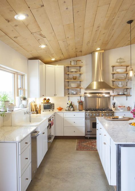 Love the hand hewn wood on the ceiling and the concrete floors of this kitchen Wood Plank Ceiling, Plank Ceiling, Cottage Style Kitchen, Wooden Ceiling, Office Gadgets, Concrete Kitchen, Kitchen Ceiling, French Country Kitchen, Wooden Ceilings