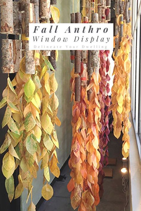 Learn how to make these simple DIY leaf press leaves for a fun autumn hanging display, inspired and created during an Anthropologie window display workshop. Delineate Your Dwelling Fall Leaves Window Display, Window Decoration Ideas For School Autumn, Thanksgiving Store Window Displays, Fall Crafts To Hang From Ceiling Classroom, Nature Window Display, Fall Storefront Window Display, Autumn School Decoration, Anthropologie Fall Window Display, Thanksgiving Window Display