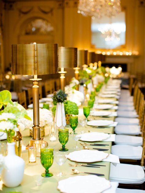 wedding reception green linen and glassware goblet gold brass table lamp decor Lamps On Wedding Table, Lamp Centerpiece Wedding, Statement Centerpieces, Lamp Centerpieces, Senior Table, Dinner Party Centerpieces, 2026 Wedding, Table Aesthetic, Lamp Inspiration