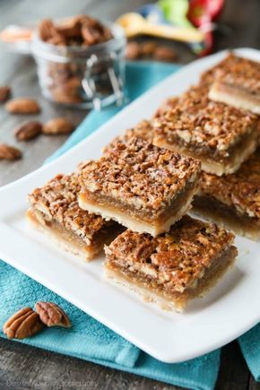 Pecan Pie Bars are made with an easy shortbread crust and delicious pecan pie filling. A crowd-pleasing Thanksgiving or Christmas dessert that will serve many guests. Easy Shortbread Crust, Pistachio Pudding Cookies, Easy Shortbread, Bars Dessert, Pecan Pie Filling, Pecan Pie Bars, Spiced Pecans, Dessert Bar Recipe, Pie Bars