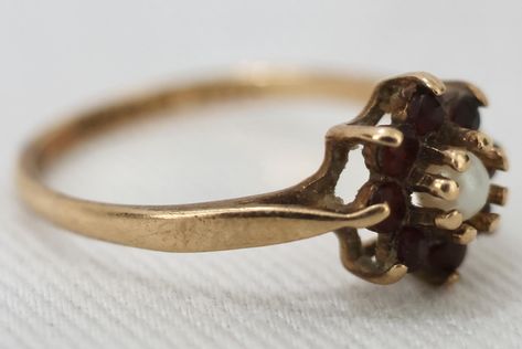 A 9k solid gold split pearl and garnet cluster ring. It weighs 1.2g and is a size 4 3/4. It has hallmarks for Birmingham 1994. It is in good condition. Price: $200AUD Cluster Ring, Birmingham, Hallmark, Garnet, Solid Gold, Split, Size 4, Ring, Gold