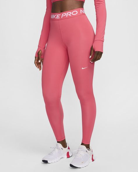 The Nike Pro Leggings are made with sweat-wicking fabric and mesh across the calves to keep you cool and dry. Soft, stretchy fabric moves with you as you sprint, lunge and stretch. This product is made with at least 50% recycled polyester fibers. Shown: Aster Pink/Pinksicle/White Style: CZ9779-629 Nike Leggings Outfit, Nike Pros Leggings, Pink Nike Pros, Legging Nike, Single Clothes, Mesh Panel Leggings, Nike Pro Leggings, Nike Pro Women, 2024 Christmas