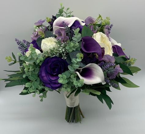 Beautiful Cadbury purple wedding flowers consisting of calla lilies, rose, gyps and a mix of foliage. Purple And Aqua Wedding, Enchanted Forest Bouquet, Purple Calla Lily Wedding Bouquet, Emerald Green And Purple Wedding, Purple Bouquet Flowers, Purple Calla Lily Bouquet, Purple Calla Lilies Wedding, Wedding Flower Types, Purple And Green Flowers