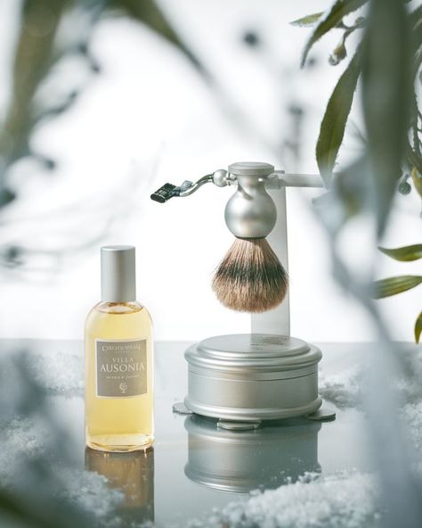 Villa Ausonia Eau de Parfum and Silver Shaving Set & Stand in snowy, woodland scene, looking through greenery. Winter Perfume, South West France, West France, Shaving Set, Niche Perfume, Christmas Photography, Luxury Perfume, Fragrance Gift, Luxury Fragrance