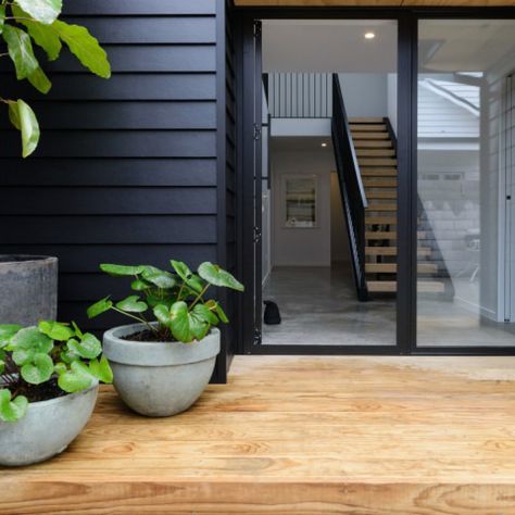 Scandinavian Exterior Design, Black Cladding, Timber Buildings, The Door Is Open, Scandi Design, Timber Cladding, House Siding, Small Buildings, Black Exterior