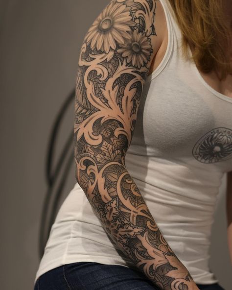 Sleeve tattoos, which cover either your whole arm or very nearly the whole thing, are for people who aren't afraid of commitment. They take time, money, and a Whole Arm Tattoos For Women, Womens Sleeve Tattoo Ideas, Tattoo Ideas Black And White, Tattoo Sleeve Themes, Womens Sleeve Tattoo, Tattoo Ideas Black, Voll Arm-tattoos, Arm Sleeve Tattoos For Women, Quarter Sleeve Tattoos