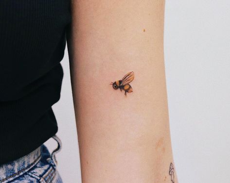 Small and Minimalist Bee Tattoos Bee Micro Tattoo, Two Bee Tattoo, Delicate Bee Tattoos For Women, Flying Bee Tattoo, Tiny Bee Tattoo, Little Bee Tattoo, Bee Tattoos For Women, Small Bumble Bee Tattoo, Honey Bee Tattoos