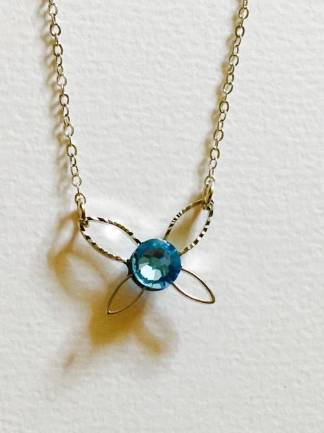 Navi necklace, by @machine_0091 | #geek #Zelda #jewelry Zelda Botw Jewelry, Zelda Jewelry Diy, Loz Jewelry, Legend Of Zelda Jewelry, Zelda Clothes, Navi Necklace, Zelda Necklace, Zelda Jewelry, Nerd Jewelry