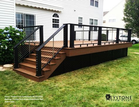 TimberTech Evolutions Brown Oak decking with TimberTech Black Evolutions Rail with Cable. Built by Keystone Custom Decks. Pergola Vines, Pergola Metal, Deck Skirting, Deck Railing Design, Black Deck, Deck Pictures, Patio Deck Designs, Deck Designs Backyard, Deck Projects