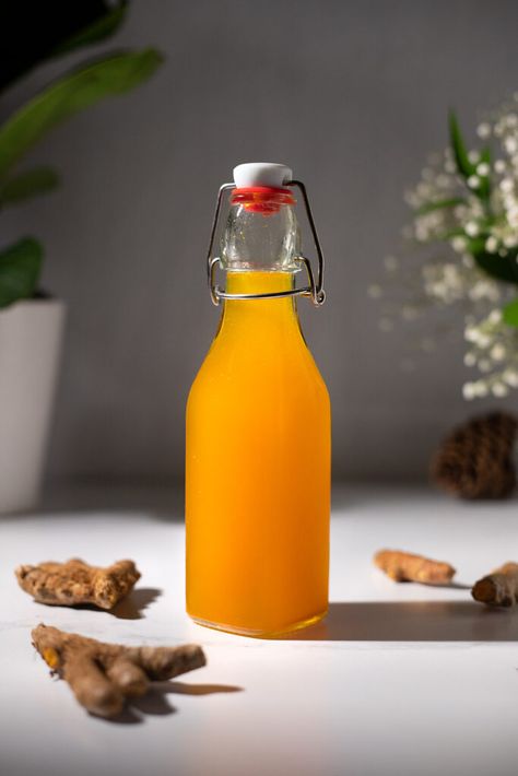 Turmeric Ginger Simple Syrup - Kitchen Habit Mango Simple Syrup Recipe, Ginger Syrup Recipe Homemade, Turmeric Mocktail, Elixer Recipes, Ginger Syrup Recipe, 2024 Cocktails, Natural Syrup, Moody Mixologist, Ginger Simple Syrup