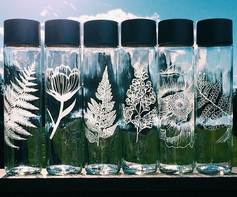 Reward yourself for sticking with a healthy habit by keeping your H20 in one of these etched glass water bottles. This unique water bottle helps reduce plastic bottle waste and comes designed with a hand etched nature themed image. Voss Water, Plastic Bottle Waste, Verre Design, Glass Engraving, Cute Water Bottles, Silhouette America, Drink More Water, Glass Water Bottle, Glass Vases