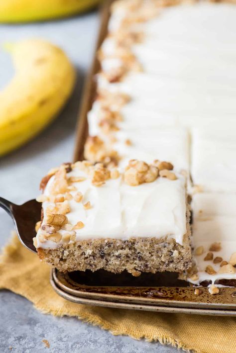 These bananas bars with cream cheese frosting are moist, big on banana flavor and the perfect dessert for a crowd. Use up ripe bananas to make frosted banana bars that your family will love! #bananabars #bananacake #bananadessert Recipes With Bananas, Bars With Cream Cheese Frosting, Bars With Cream Cheese, Big Banana, Banana Bars, Nut Bar, Banana Dessert, Desserts For A Crowd, Ripe Bananas