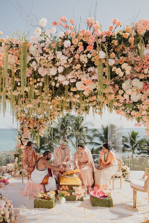 Discover 33 wedding mandap ideas from real ceremonies in settings as diverse as formal ballrooms and ocean-and-mountainside perches. Beach Mandap Decor, Outdoor Hindu Wedding, Wedding Mandap Ideas, Indian Beach Wedding, Mandap Ideas, Hindu Wedding Decorations, Indian Wedding Flowers, Indian Wedding Theme, Indian Destination Wedding