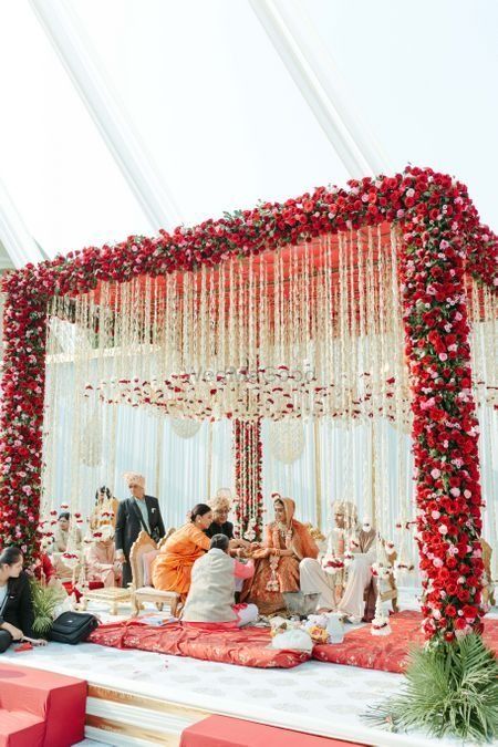 Weddings, Indian Wedding Planning Online - WedMeGood Indian Wedding Setup, Simple Wedding Mandap Decor, Indian Barn Wedding, Mandap Decoration Wedding, Vidhi Mandap Indian Weddings, Wedding Decorations Indian Stage, Simple Indian Wedding Decorations, Simple Mandap Decor Indian, Indian Wedding Entrance Decor