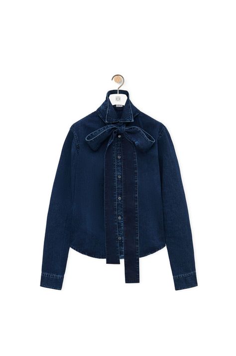 LOEWE Bow shirt in denim Washed Indigo Loewe Denim, Bow Jeans, Ootd Korean Style, Denim Wallet, Bow Shirt, Bow Shirts, Denim Blouse, Leather Denim, Dark Blue Denim