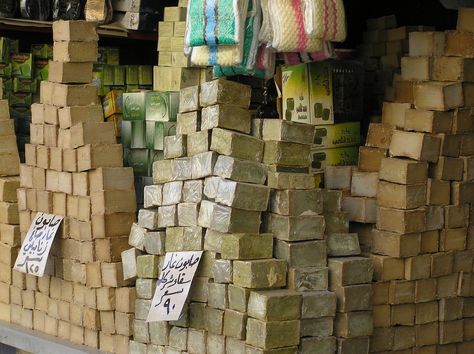 Along with Marseilles Soap and Castile Soap, Aleppo Soap is possibly the most famous soap manufactured from vegetable oil (mainly olive oil) following traditional methods. It is believed that the technique of manufacturing soap from vegetable oil originated in the Middle East, from where it was exported to Europe during the period of the Crusades. Soap Manufacturing, Johor Bahru Malaysia, Aleppo Soap, The Crusades, Soap Display, Fancy Soap, Marseille Soap, Rotary Club, Homemade Soap Recipes