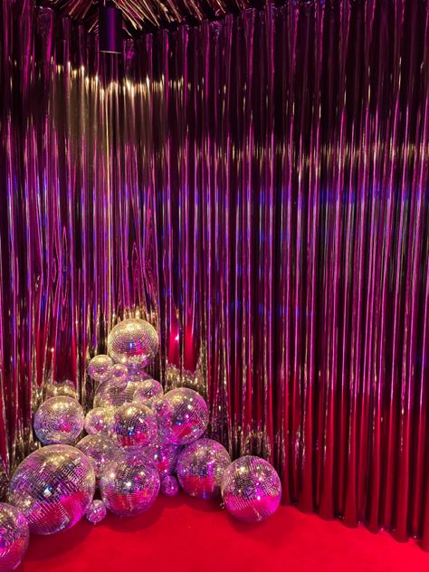 Art installation, disco balls, red, pink, parade, shiny, purple, New York City, soho, store, design Disco Ball Stage Design, Red Disco Party, Disco Ball Photo Backdrop, Ball Art Installation, Disco Color Palette, Disco Ball Ceiling, Disco Ball Installation, Disco Backdrop, Disco Colors