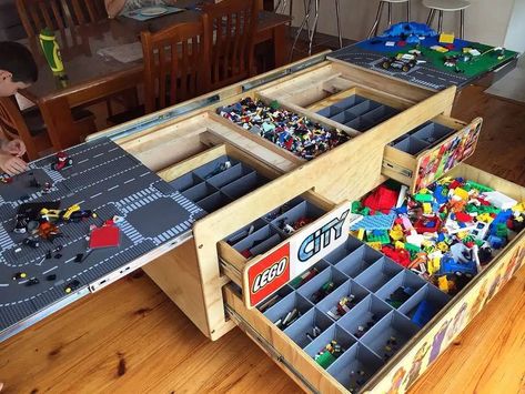 The folding-out table with many compartments opens up to so much storage space for Legos. The drawers also have organizers and dividers to sort out lego pieces. // Photo Credit: Instagram @ACCURIDEUS Lego Storage Table, Duplo Storage, Diy Lego Storage, Lego Activity Table, Lego Room Ideas, Lego Table With Storage, Lego Desk, Lego Room Decor, Lego Table Diy