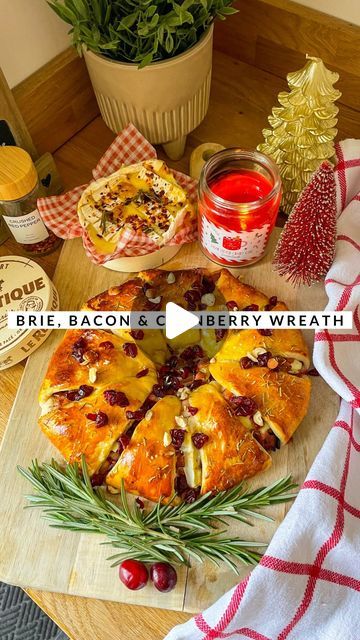 Charlotte-Louise Harvey on Instagram: "Brie, Bacon & Cranberry Wreath with Camembert Side 🧀🥓 I think this has to be my favourite Christmas cooking reel so far! Both of my favourite cheeses, brie and camembert. How good would this look in the middle of a festive buffet or even just on its own?! 💫🤩

Ingredients;
- 2 340g @jus_rol Croissants
- Block of Brie
- Cranberry Sauce
- 8 Smoked Bacon Medallions
- Honey
- Thyme
- Rosemary
- Camembert
- Fresh Rosemary
- 1 Egg, egg wash
- Chilli Flakes
- Garlic Purée
- Cranberries (dried and whole)
- Hazelnuts

Method;
- Cook your bacon medallions, chop into small pieces and set aside.
- Line a baking tray with greaseproof paper.
- Add a small ramekin to the middle.
- Roll your dough out and cut them slightly to make smaller triangles (I made mini cr Brie Bacon Cranberry, Brie Bacon Cranberry Wreath, Brie And Cranberry Appetizer, Festive Buffet, Cranberry Wreath, Cranberries Dried, Cranberry Appetizer, Brie Cranberry, Egg Egg