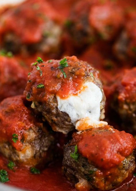 Tender and flavorful homemade meatballs stuffed with gooey mozzarella cheese. These mozzarella stuffed meatballs are what dreams are made of! #meatballs #mozzarella #cheese #stuffed #meatballrecipe #italian #italianrecipes #cheesy #recipes #iheartnaptime Easy Mozzarella Stuffed Meatballs, Cheesy Meatball Recipes, Baked Mozzarella, Stuffed Meatballs, Cheesy Meatballs, Mozzarella Stuffed Meatballs, Cheese Stuffed Meatballs, Italian Meatballs Recipe, Kitchen Favorites