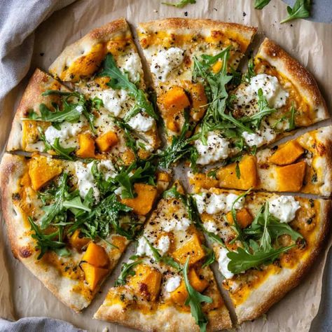 Pizza topped with roasted butternut squash, goat cheese, and fresh arugula, served on parchment paper – Butternut squash recipes. Butternut Squash Pizza Recipe, Butternut Squash Flatbread, Butternut Squash Goat Cheese, Squash Goat Cheese, Butternut Squash Muffins, Goats Cheese Flatbread, Butternut Squash Gratin, Squash Muffins, Butternut Squash Pizza