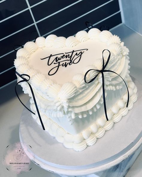 🤍 Twenty Five 🤍 Simple elegance. This 10-12 serving heart cake was made with vanilla/chocolate marble, and covered in a bright white Swiss meringue buttercream Cake drum • @cakebonofficial Food gel • @chefmaster Topper made with • @cricut Smoother • @sweet_escape001 Piping tips • @wiltoncakes Everything else! • @heb . . . . . . . #cake #sanantonio #sanantoniosmallbusiness #sanantoniocakes #sanantonioeats #sanantonioevents #sanantoniofood #sanantoniofoodie #sanantoniobaker #bakedsa #... Swiss Meringue Buttercream Cake, Coquette Party, Boda Ideas, Meringue Buttercream, Swiss Meringue, Swiss Meringue Buttercream, 18th Birthday Party, Piping Tips, Vanilla Chocolate