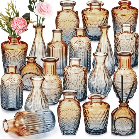 PRICES MAY VARY. Rich in Quantity: this package comes with 20 pieces of small centerpiece vases in 10 styles, the quantity is sufficient to meet your home decoration needs, you can also share them with others; Each vase is firmly wrapped in the thick boxes to avoid breakage in transit Retro Design: the glass vases for centerpieces are decorated with etching patterns, look retro and elegant, they will become the delicate centerpieces for the window, dining or wedding table Easy to Store and Displ Centerpieces Rustic, Vases For Centerpieces, Glass Vases Centerpieces, Vases For Flowers, Fall Girl, Small Vases, Glass Bud Vase, Mini Glass Bottles, Glass Flower Vases